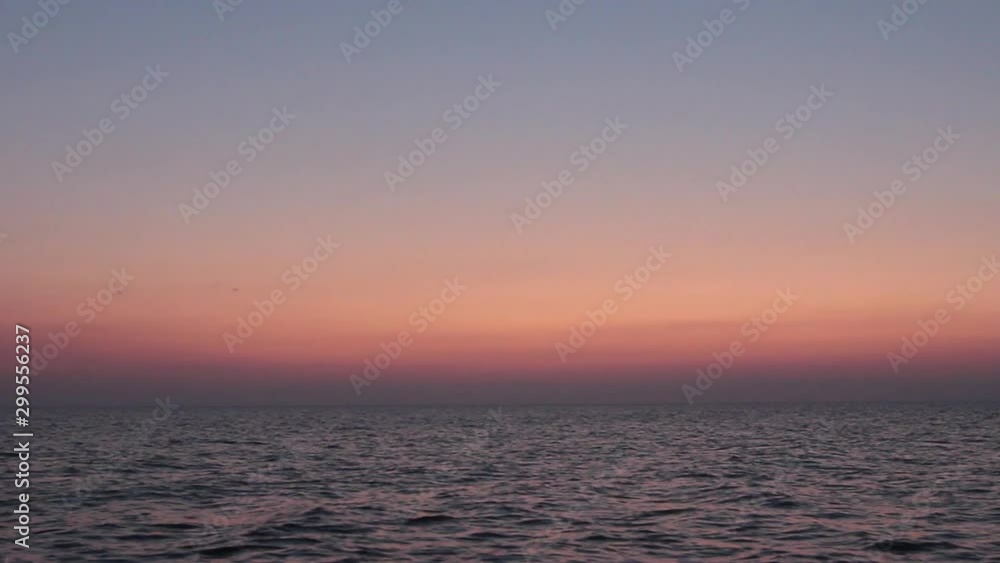 sunset on the seashore. calm sunset on the seashore. calm