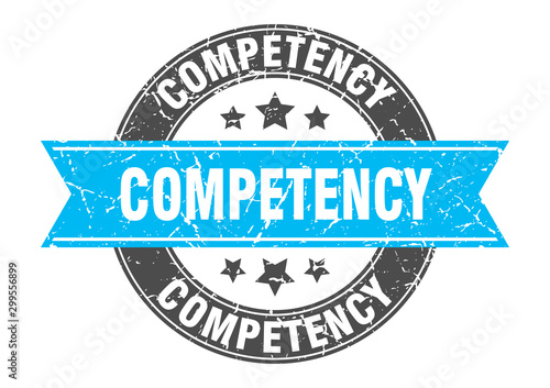 competency round stamp with turquoise ribbon. competency