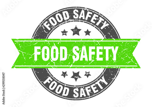 food safety round stamp with green ribbon. food safety