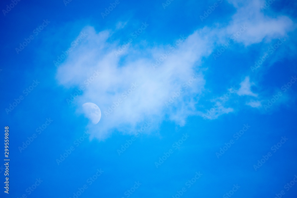blue sky with clouds and moon blue sky with clouds and moon
