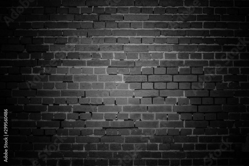 Dark old bricks wall surface abstract pattern background. Background of old vintage brick wall