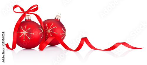 Two red Christmas decoration bauble with ribbon bow isolated on white background