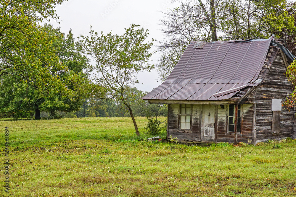 Abandoned, old house remains in a raural field. Abandoned, old house remains in a raural field.