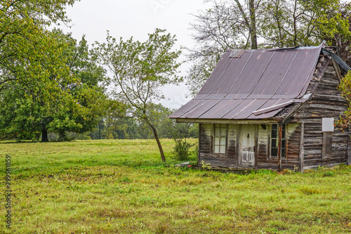   Abandoned  old house remains in a raural field.