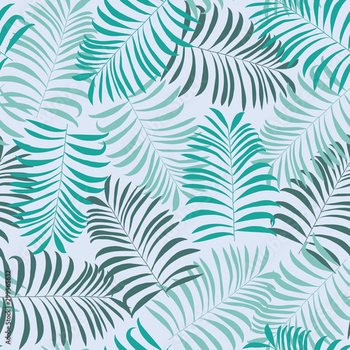Tropical seamless pattern with palm leaves © Elinnet