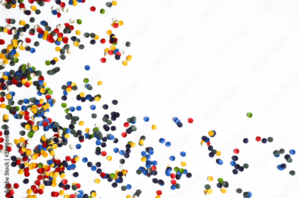 Colorful confetti on a white background. Happy New year, Christmas, Birthday and other holidays