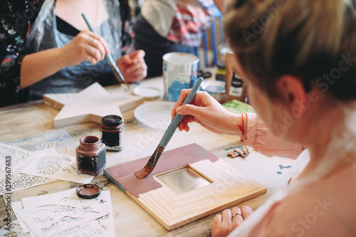 master class on creativity. girl makes a frame