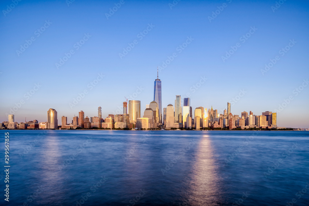 Fototapeta premium Manhattan skyline view from New Jersey Exchange Place during sunset hour