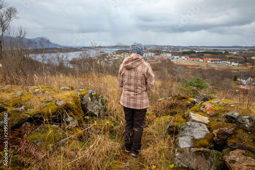 Happy walking woman in Skarsåsen,Brønnøy,Nordland county