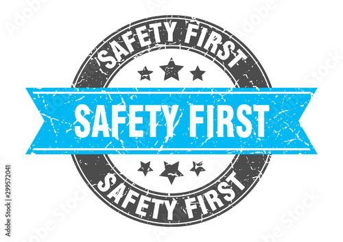safety first round stamp with turquoise ribbon. safety first