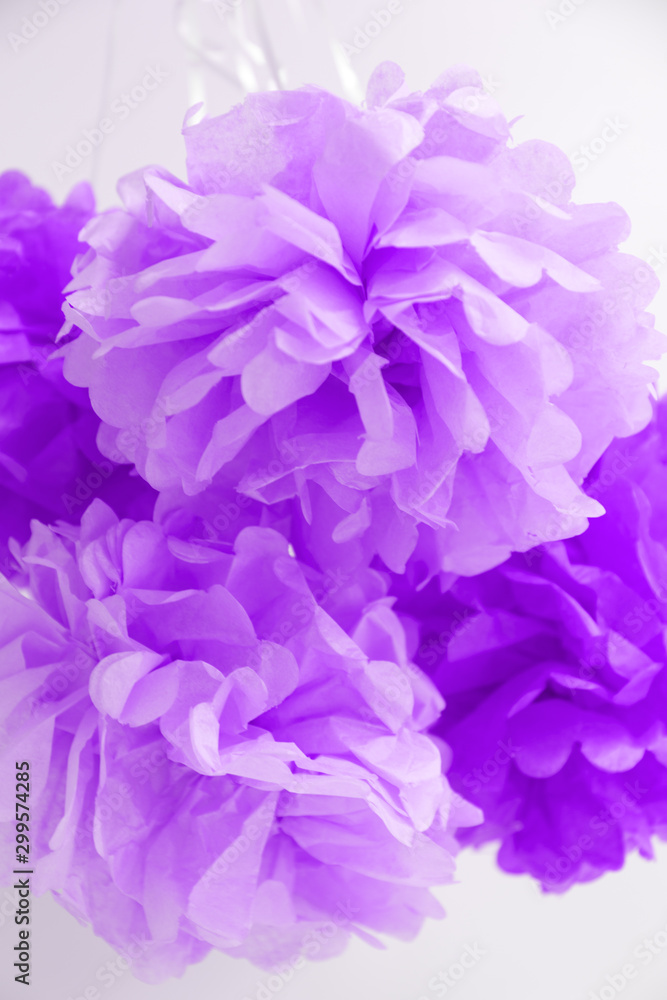 Paper flowers at the girl baby shower party. Holiday, celebration concept. Festive party background. Vertical