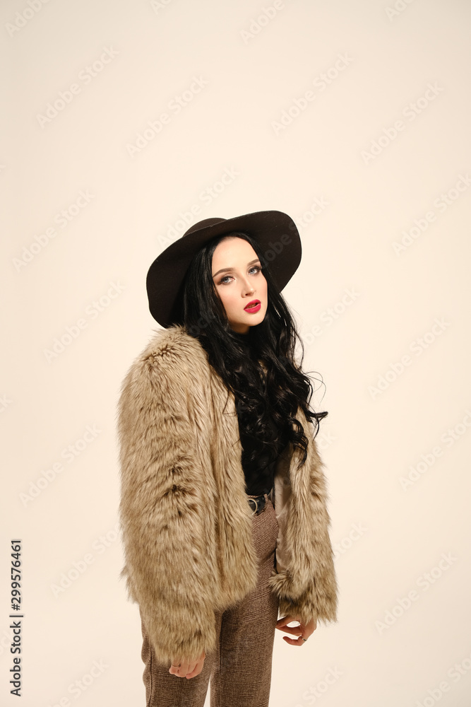 emotional woman posing on a light background. emotional woman posing on a light background.