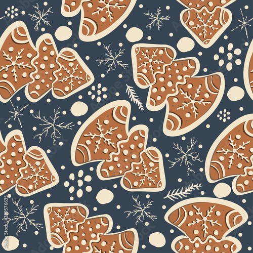 Seamless Winter Pattern with hand drawn gingerbread cookies and funny winter doodles