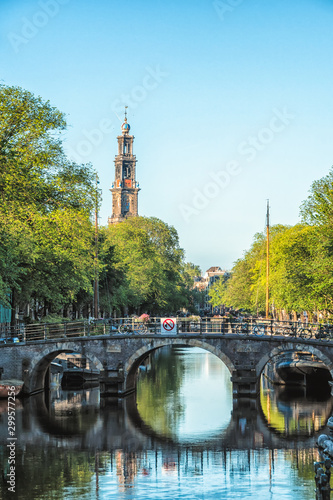 Beautiful views of the streets, ancient buildings, people, embankments of Amsterdam.