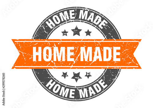 home made round stamp with orange ribbon. home made