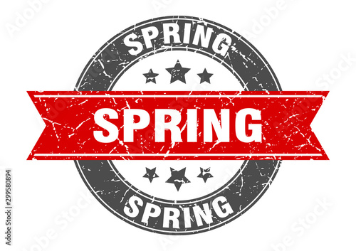 spring round stamp with red ribbon. spring