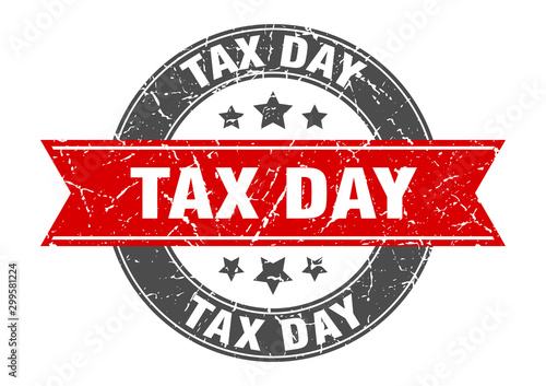 tax day round stamp with red ribbon. tax day