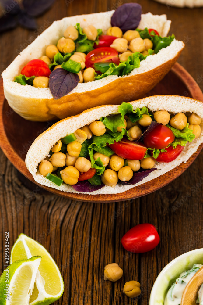 Garbanzo Bean or Chickpea Salad Veggie Pitas. Selective focus. Garbanzo Bean or Chickpea Salad Veggie Pitas. Selective focus.