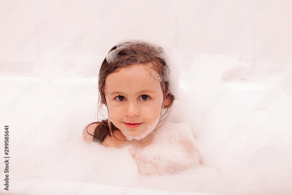 happy funny kid laughing and bathed in the bath happy funny kid laughing and bathed in the bath