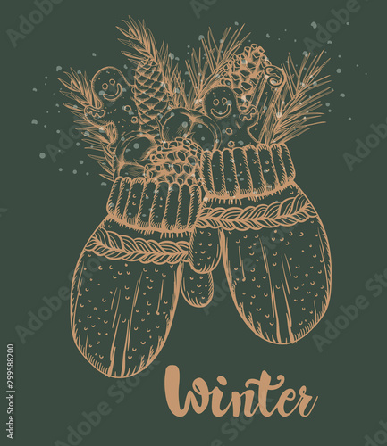 Winter mittens filled with gingerbread cookie, cinnamon sticks, conifer cone,...