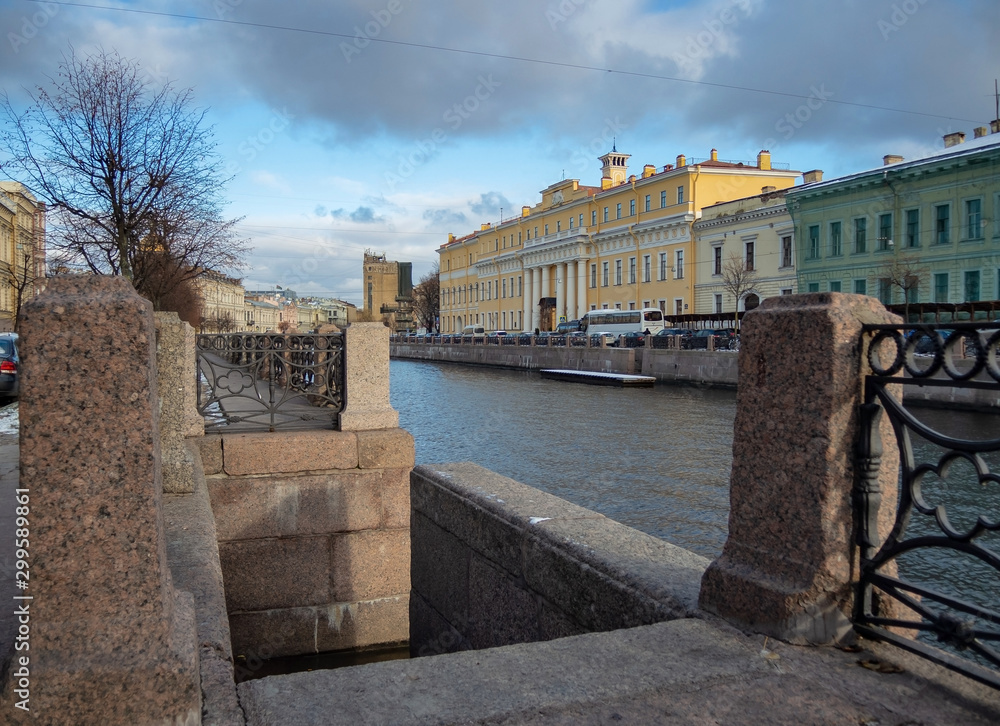 Late autumn, the center of St. Petersburg, granite embankments, colored bridges and ancient architecture