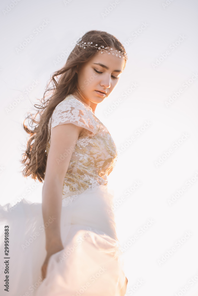 Beautiful bride outdoors in a forest. Beautiful bride outdoors in a forest.