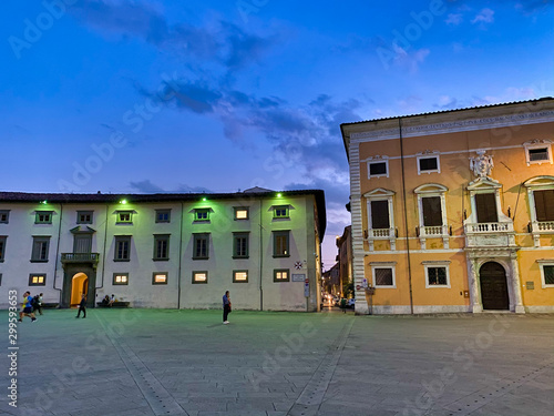 PISA, ITALY - SEPTEMBER 27, 2019: Tourists in Knights Square at sunset © jovannig