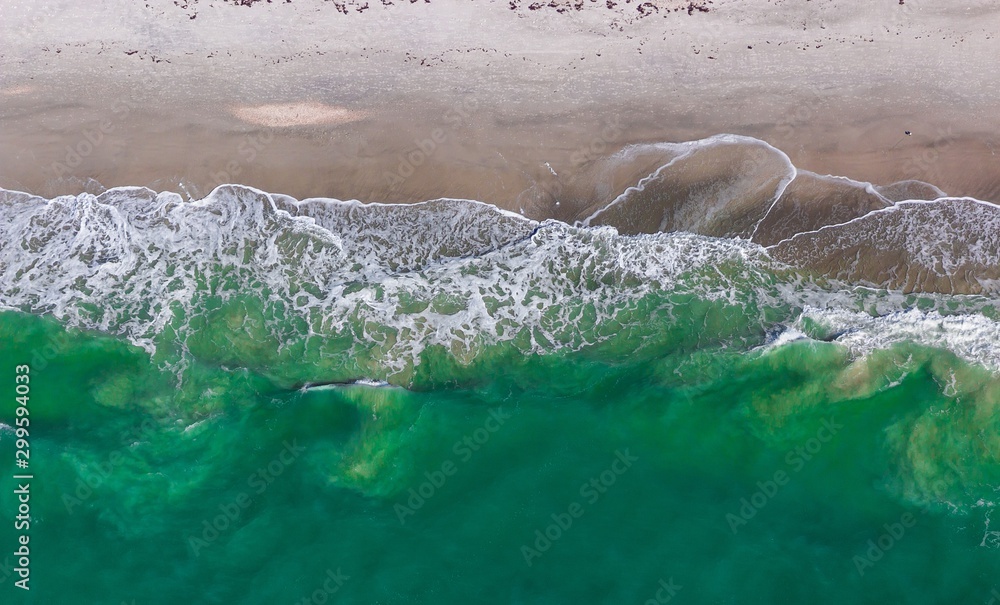 ocean wave on shore from above