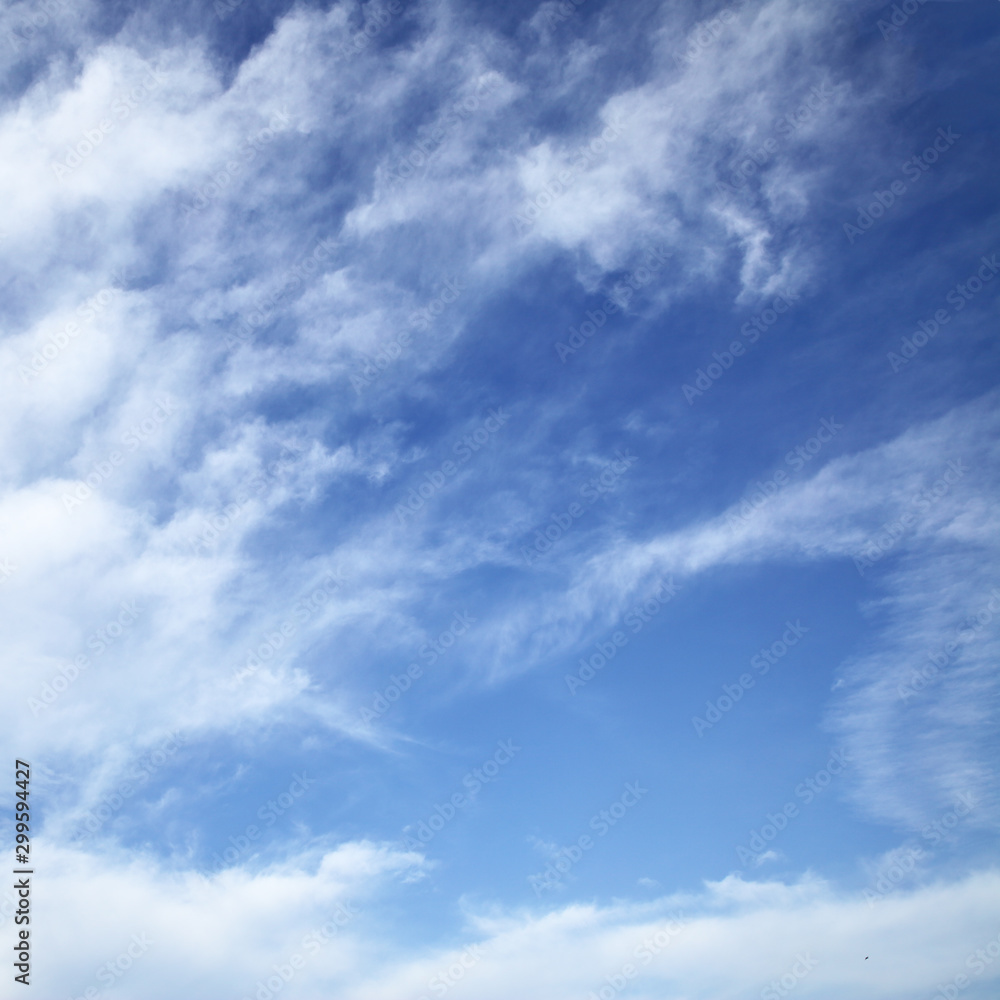 Blue sky with light clouds - background