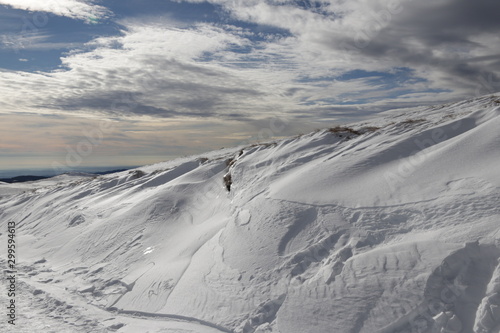 winter landscape with mountains and blue sky