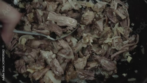 Cooking shredded rib in frying pan
