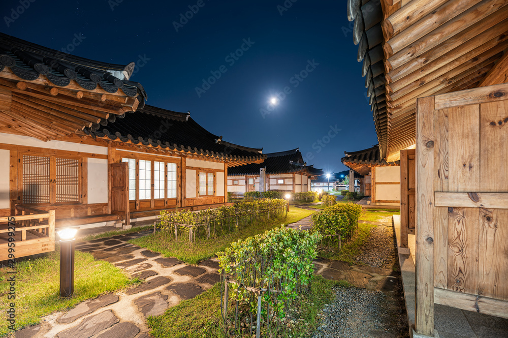 Architecture traditional wooden house illumination with blue sky at Ojuk Hanok Village, Gangwon-do Architecture traditional wooden house illumination with blue sky at Ojuk Hanok Village, Gangwon-do