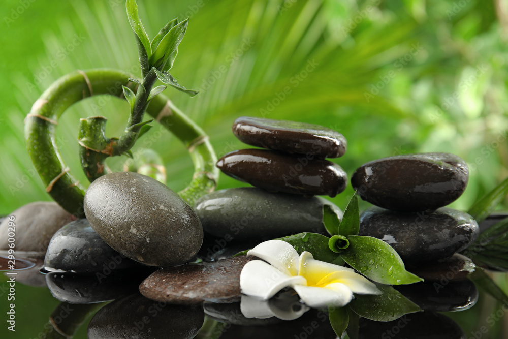 Composition with stones against blurred background. Zen concept Composition with stones against blurred background. Zen concept