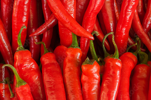 Red pepper for salad lies on the window of a market, store, supermarket