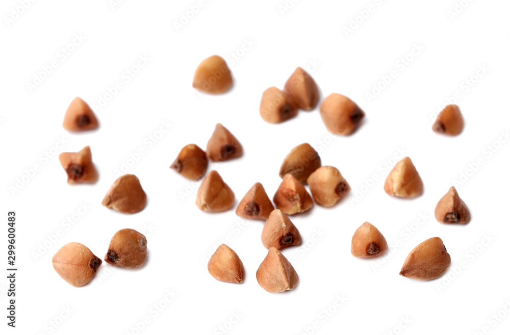 Buckwheat grains isolated on white. Organic cereal Buckwheat grains isolated on white. Organic cereal