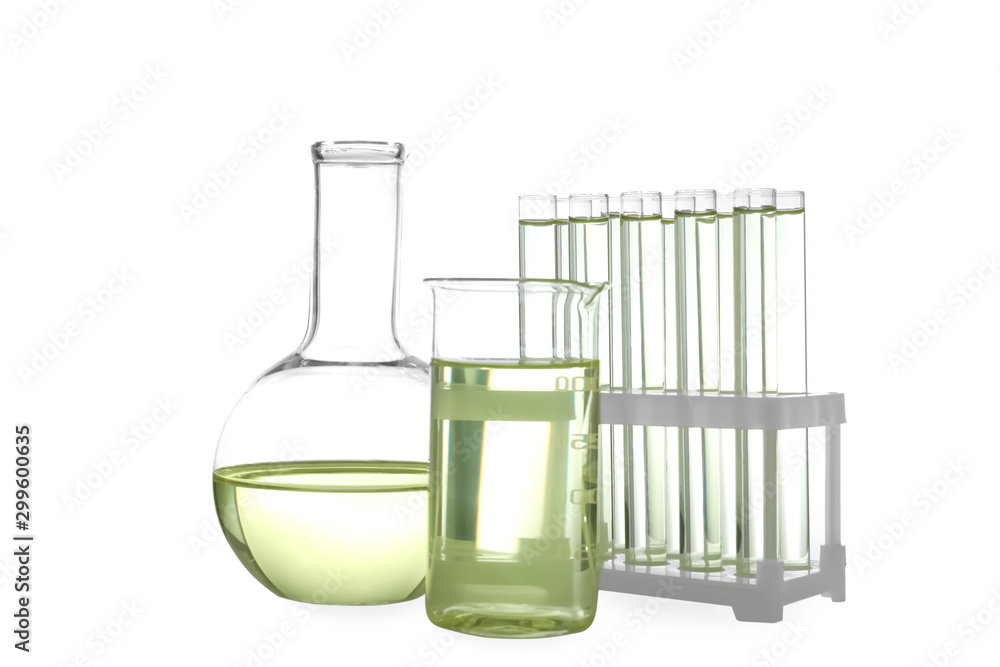 Glassware with liquids isolated on white. Laboratory analysis Glassware with liquids isolated on white. Laboratory analysis