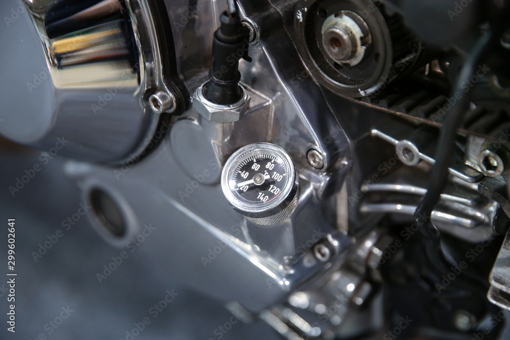 analog temperature sensor on a motorcycle engine. analog gauge oil