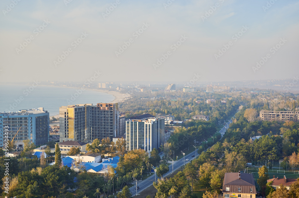 Naklejka premium view from the ferris wheel of the city standing on the coast