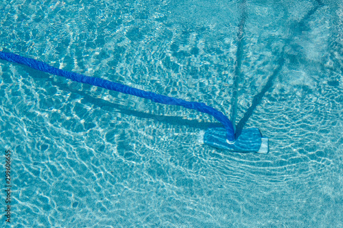 The water vacuum cleaner for the pool. Care of the pool. How to clean the pool. Underwater vacuum cleaner. Pool cleaning.