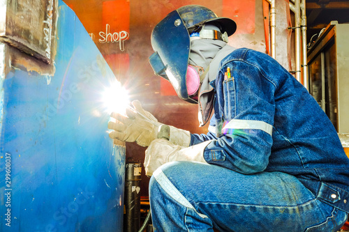 Welder technician work in fabrication shop