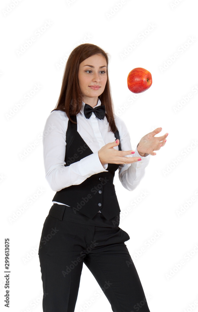 Young beautiful woman catches a falling Apple Young beautiful woman catches a falling Apple