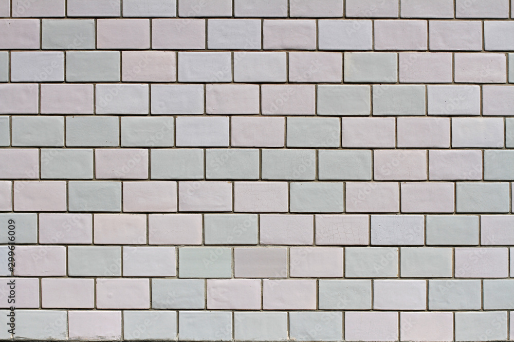 Pastel (white and blue) ceramic wall as background or texture