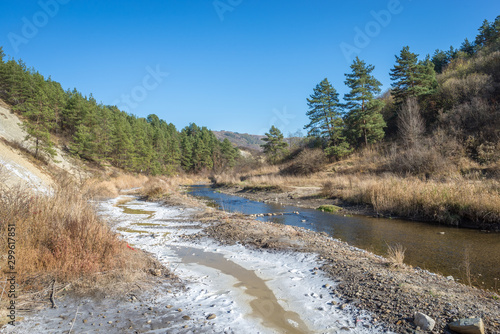 Stream with salt deposit in Salt Mountains near Praid in Transylvania, Romania