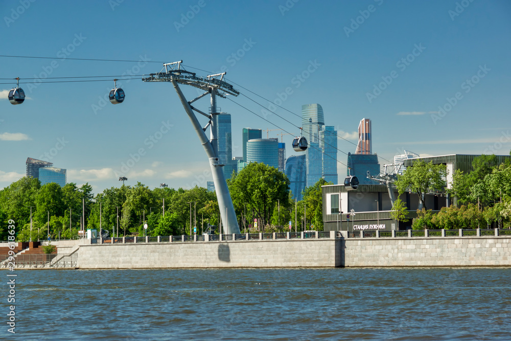 Moscow, Russia - June 5, 2019: Funicular over the Moscow River in the Sparrow Hills. View of the Moscow City Towers