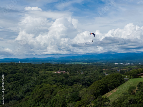 Beautiful aerial landscape view of people Parapenting in Costa Rica