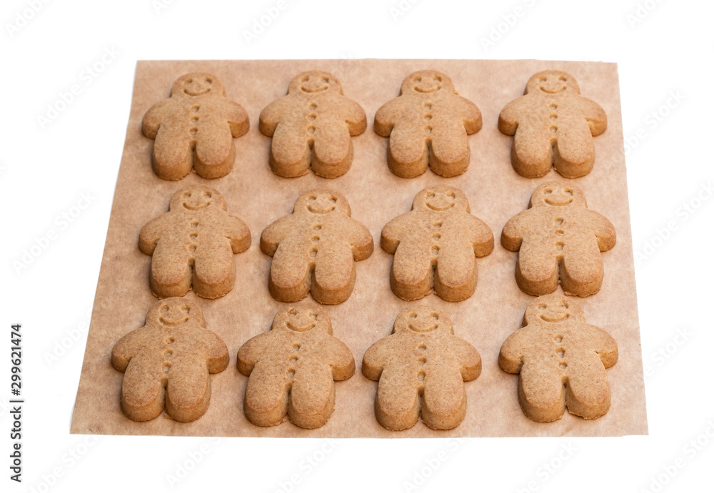 Set of baked gingerbread man cookies isolated on white Set of baked gingerbread man cookies isolated on white