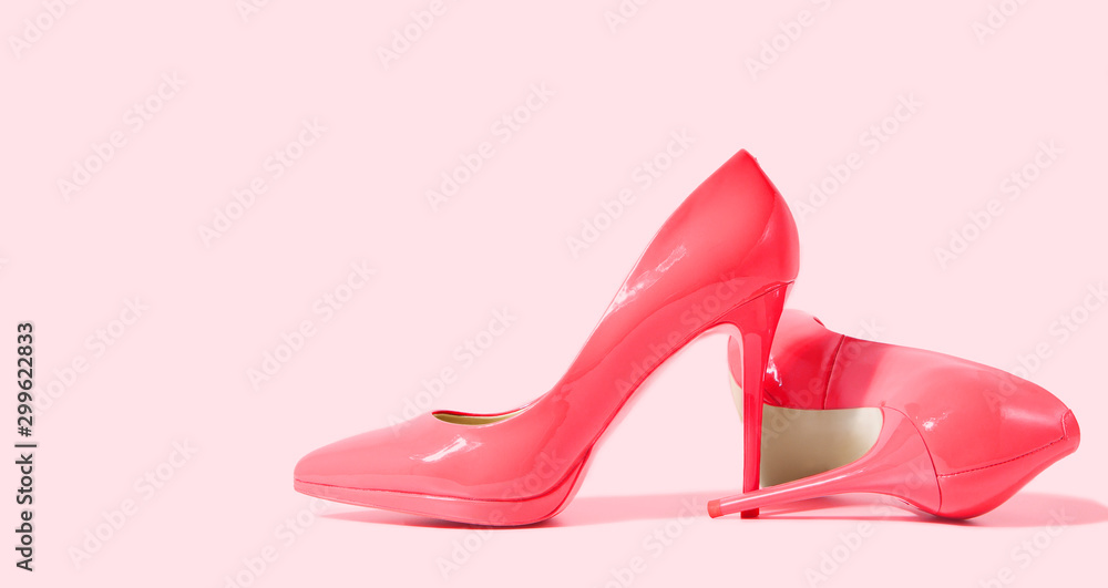 Woman Shoes Banner. High heels closeup. Top view. Women fashion. Ladies  accessories. Girly casual formal shoe isolated. pink background. Footwear  on floor. Copy space, mockup. flat lay Selective focus Stock Photo