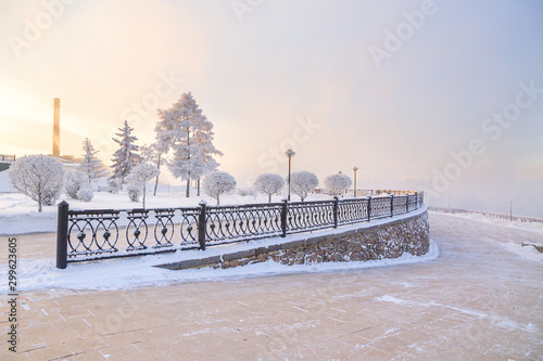 Winter landscape of frosty trees, white snow in city park. Trees covered with snow in Siberia, Irkutsk near lake Baikal. Extremely cold winter © Elena Sistaliuk