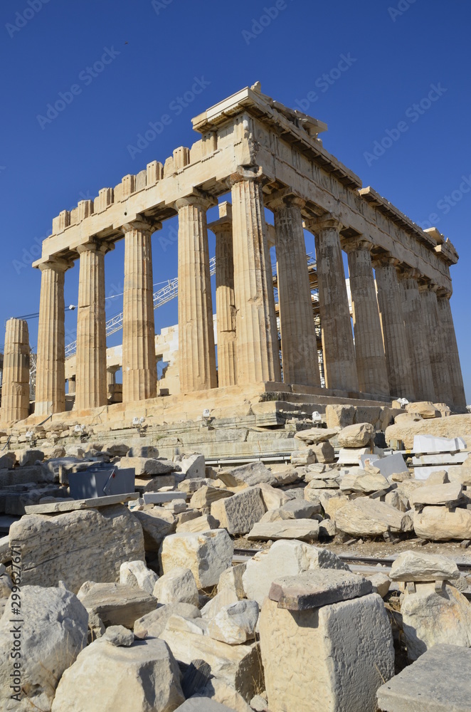 Athens, Greece, 10.28.2019. Ruins of Parthenon temple on a bright day in  Athenian Acropolis - world heritage site. Religious building of ancient times. 