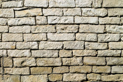 Typical natural stone brick wall texture